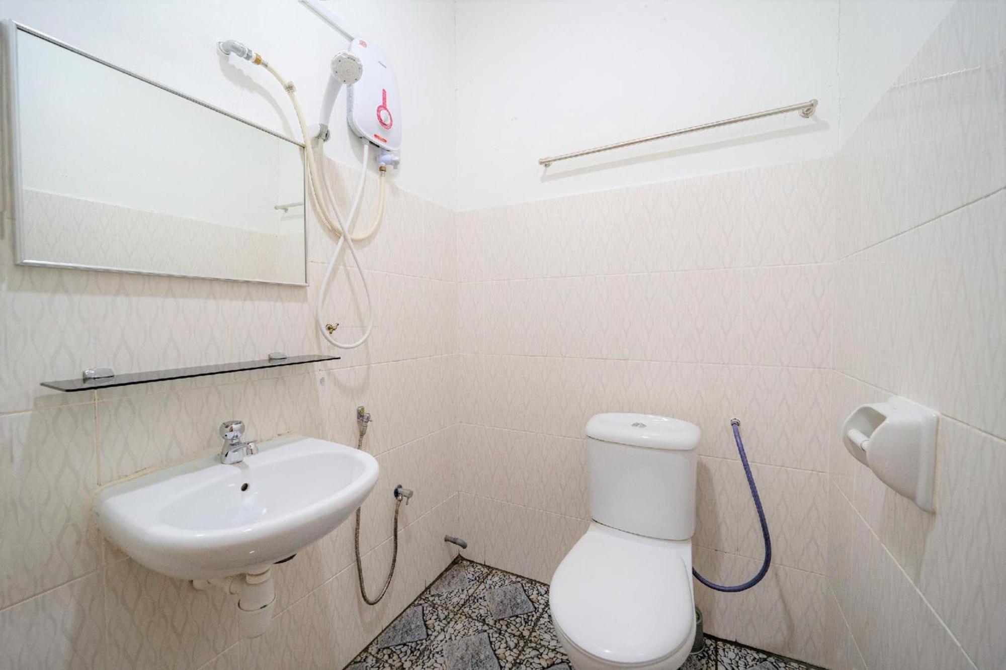 Super Oyo 89807 My Budget Home Batu Feringgi Exterior foto
